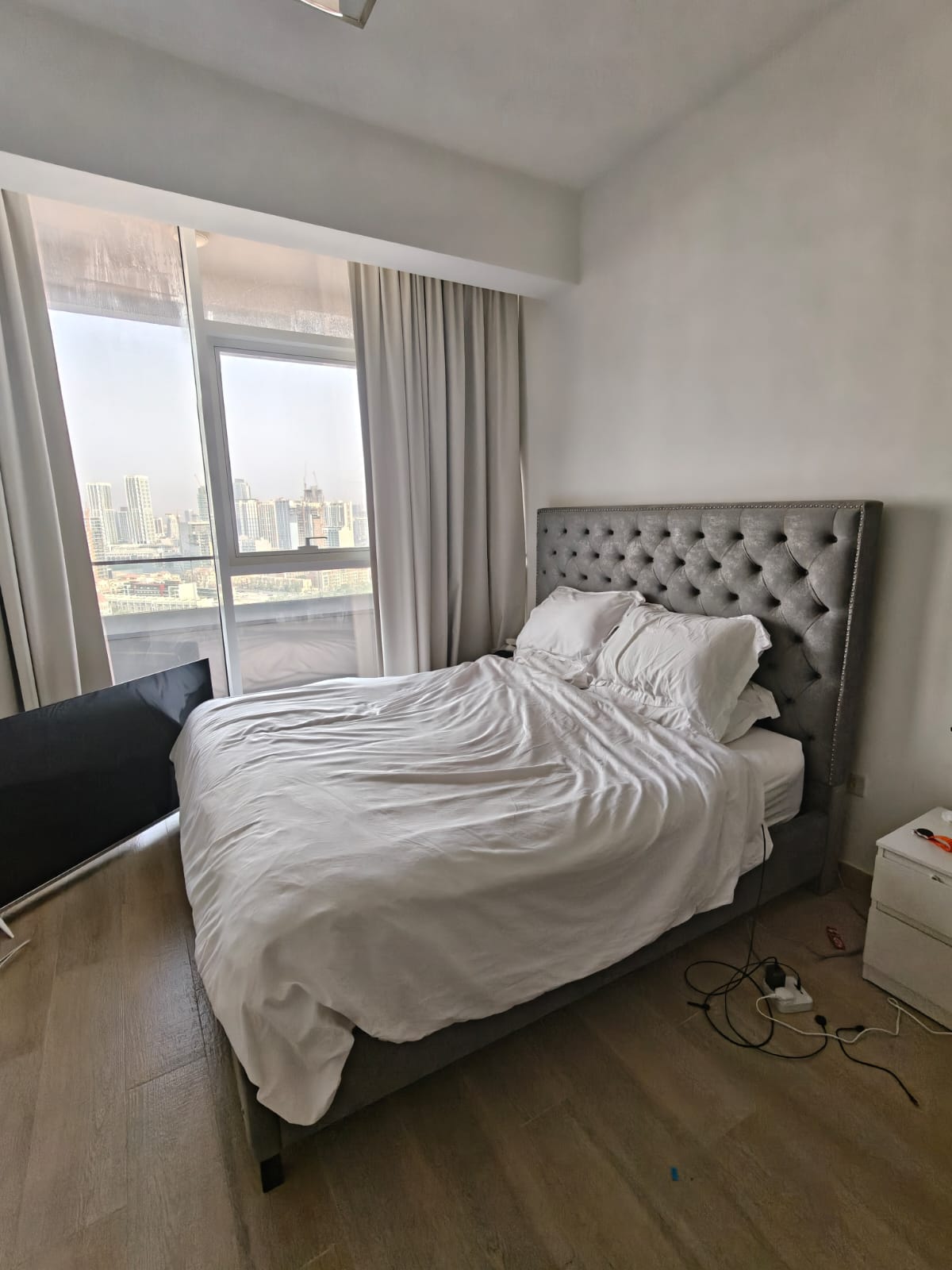 Grey tufted velvet wingback bed frame