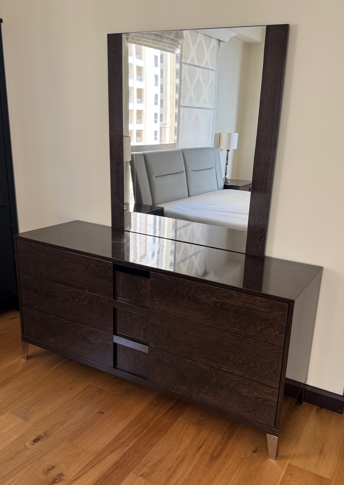 Dark wood dresser with 6 drawers and large rectangular mirror