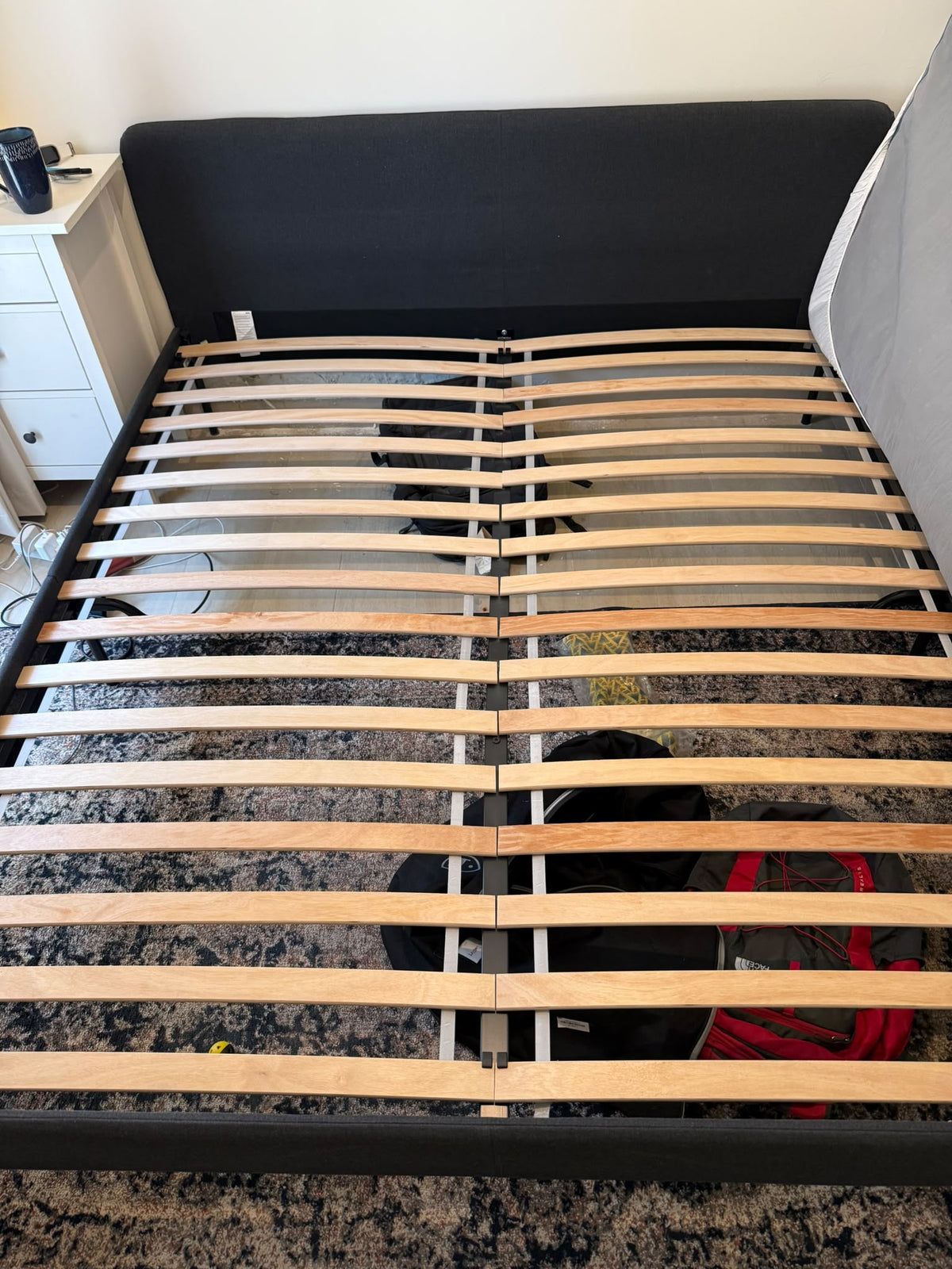 Black Upholstered Bed Frame with Wooden Slats