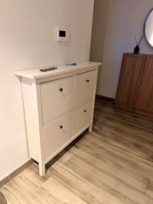 White shoe cabinet with 4 flip-down compartments