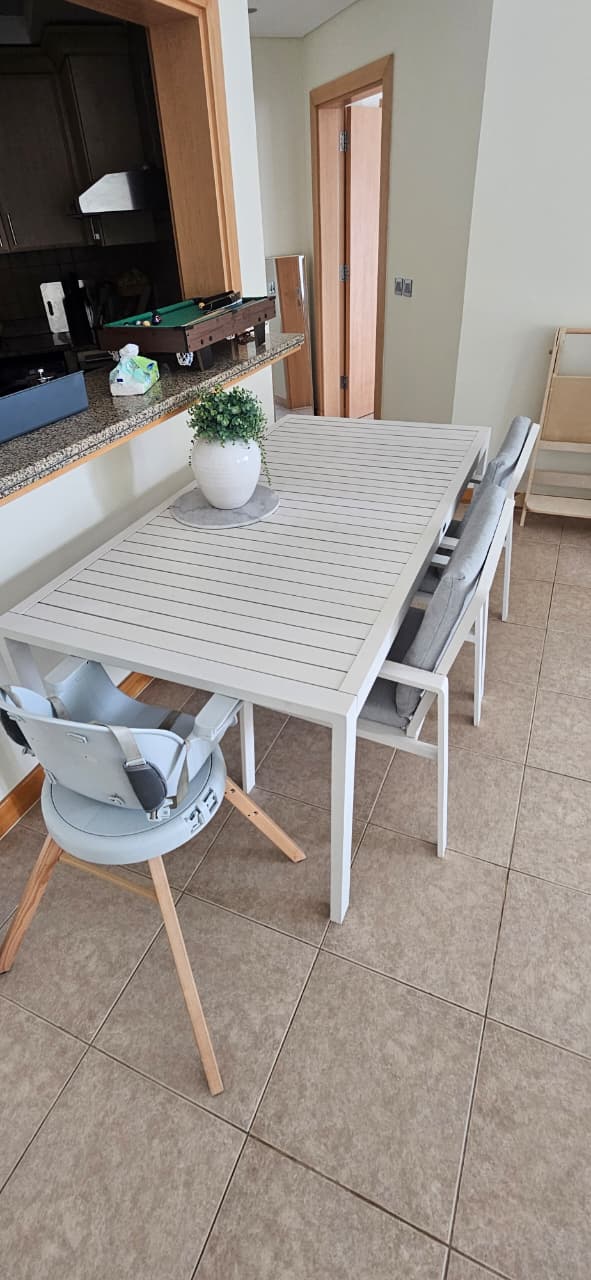 Outdoor dining table set with chairs