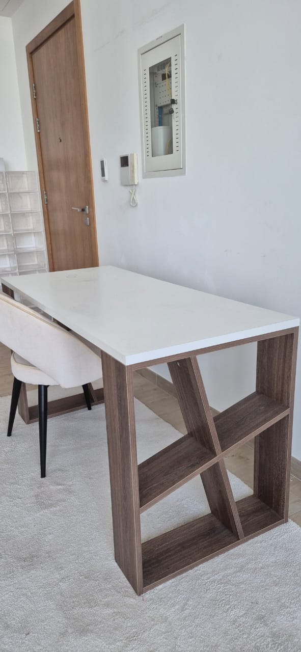 White top dining table with walnut open shelf base, front view