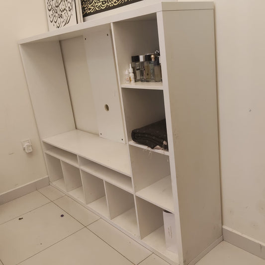 White multi-compartment shelving and media unit