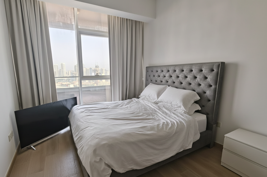 Grey tufted velvet wingback bed frame styled product photo