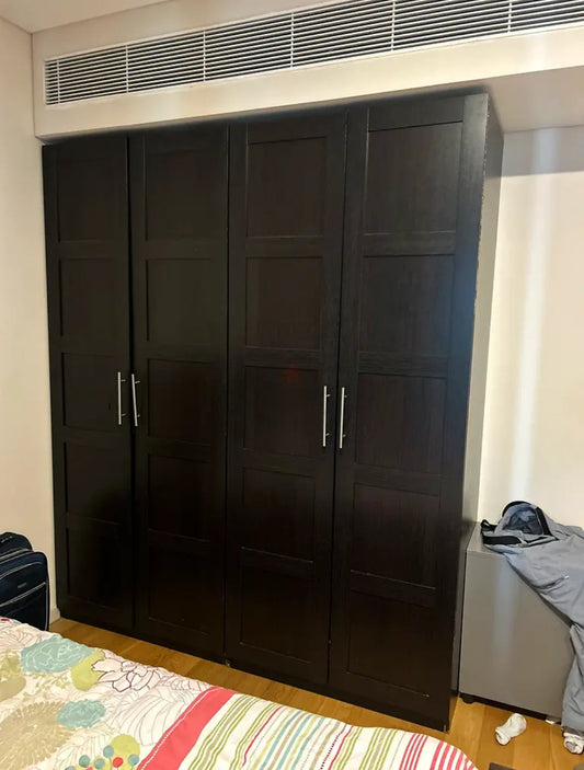 Pre-loved 4-door dark wood wardrobe