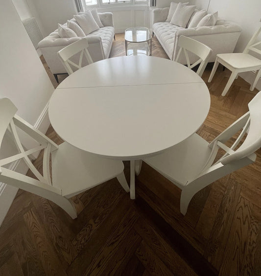IKEA rosentorp extendable dining table with 6 ingolf chairs
